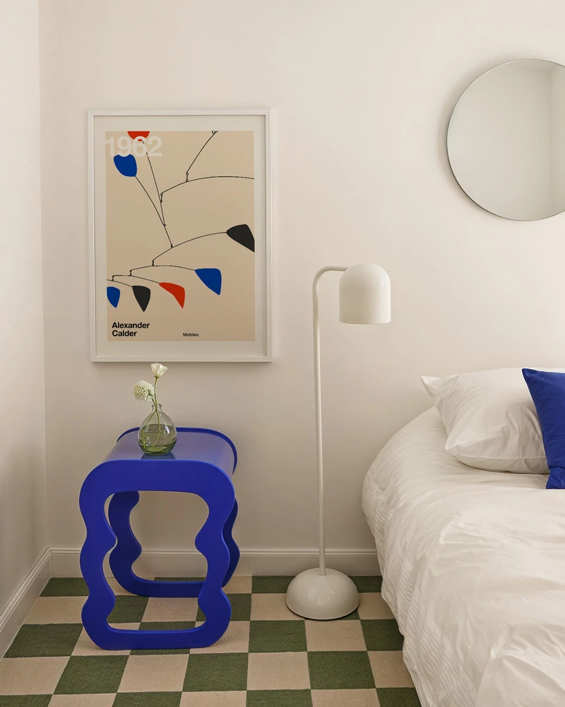 Abstract and contemporary art prints in a bedroom