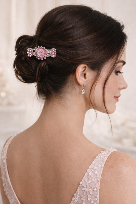Sunflower Aura Crystal Hair Jaw worn in hair: woman from behind, updo, small pink flower-shaped clip