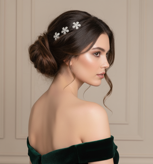 Aurélia Bloom Crystal Magnetic Barrette: small white flower clips worn in an updo, dark green velvet top