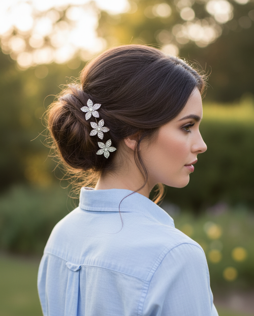 Petal Blossom Crystal Hair Stick worn in hair: side view of a person with dark hair in a low updo