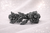 Eternal Rose Crystal Barrette: black/grey-stone leaf-and-rose barrette on pale sparkly backdrop, landscape frame