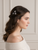 Flower Magnetic Barrette: two small clear crystal flower clips worn in wavy brown hair