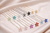 Petite Fleur Crystal Hair Stick: about sixteen flower sticks in assorted colours on satin