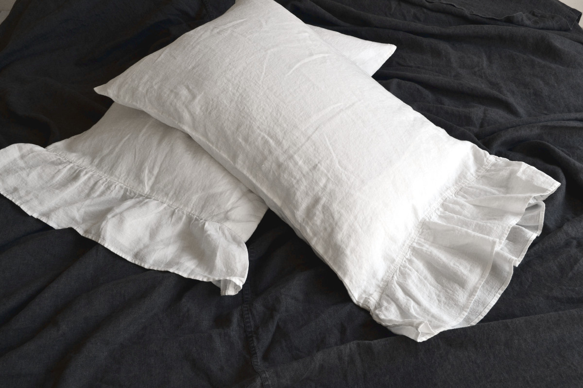 Antique white linen pillowcase with ruffle