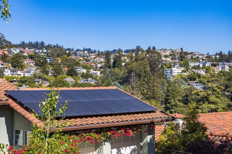 Solar array on a hillside home roof