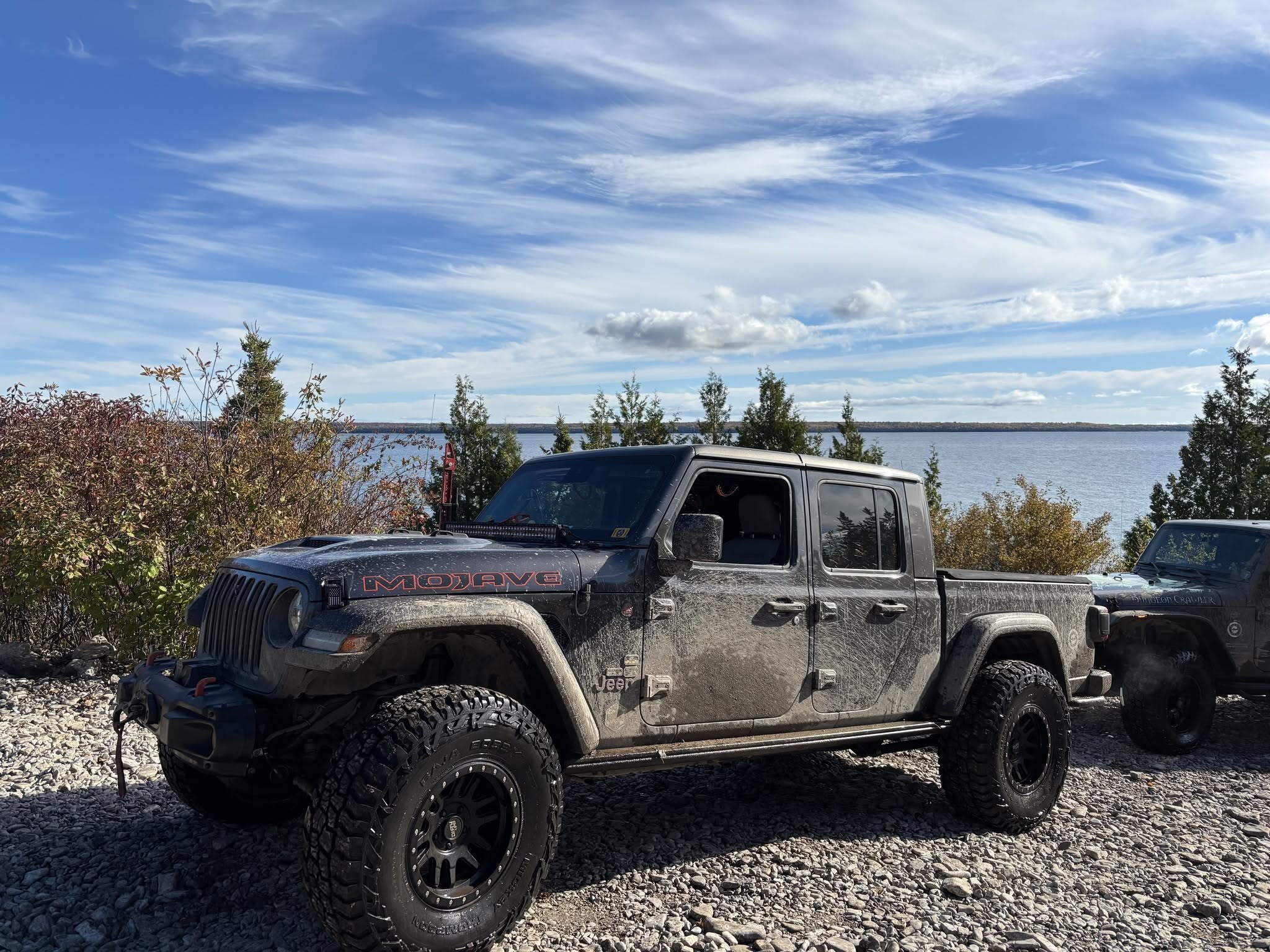 Jeep Gladiator Mojave on 37 inch tires with a TeraFlex leveling kit, on the trail