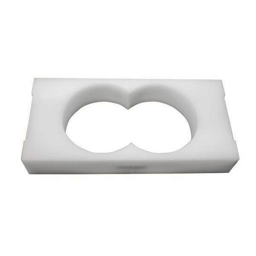 Gilson Company Cylindrical Mold for Hamburg Testing, white foam mold with two circular cavities for laboratory sample testing.