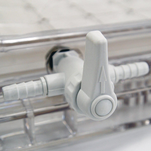 Lab Companion Stopcock Assembly for VDC-31 Series Vacuum Desiccators, white plastic valve with arrow indicator mounted on a vacuum desiccator