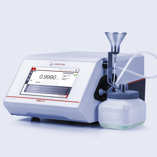 Anton Paar DMA 502 Compact Digital Density Meter, laboratory instrument with digital display and sample container for precise density measurements.