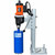 KOR-IT K-90 12in Milwaukee Core Drill with Anchor Bolts Base, industrial-grade drilling equipment with orange and black electric motor mounted on a metal frame with anchor bolts, along with a blue core drill casing labeled KOR-IT.