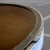 Deslauriers Steel Chamfer Ring, 24 inch diameter, 3/4 x 3/4 full round with tabs, close-up view showing the metal edge and design features.