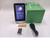 Sper Scientific Multi-Function Indoor Air Quality Monitor, handheld device displaying air quality metrics including CO2 levels, connected with a sensor probe and instruction manual.