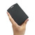 Sanwa Illuminance Meter, pocket-sized light measurement device, handheld light meter in black color.