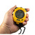 Sper Scientific Advanced Decimal Display Stopwatch, compact digital stopwatch in yellow with LCD display and control buttons.