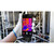 Uni-Trend iOS / Android Compatible Smartphone Thermal Imaging Camera, person holding smartphone with thermal image of industrial pipes on screen, white glove, industrial background.
