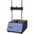 Gilson Company Marshall Stability Load Frame, 10,000lb with a black and blue control panel, steel vertical columns, and a circular load plate for material testing.