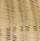 Dark Bronze/Natural Rattan