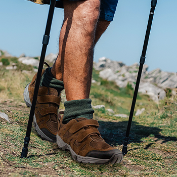 Close up of man hiking wearing Apex Balance Hiker Shoe