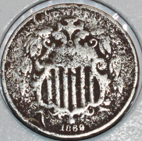 1869-P Shield Nickel. Surface damage. You will receive the coin shown -  Quality Collectible Coins