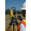 Contractor using Spectra Precision DET-2K digital theodolite on tripod for construction layout and angle measurement