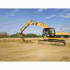 CAT 320CL excavator digging grade with Spectra laser on tripod