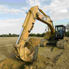 LR60W-MM receiver mounted on CAT excavator dipper arm during dig