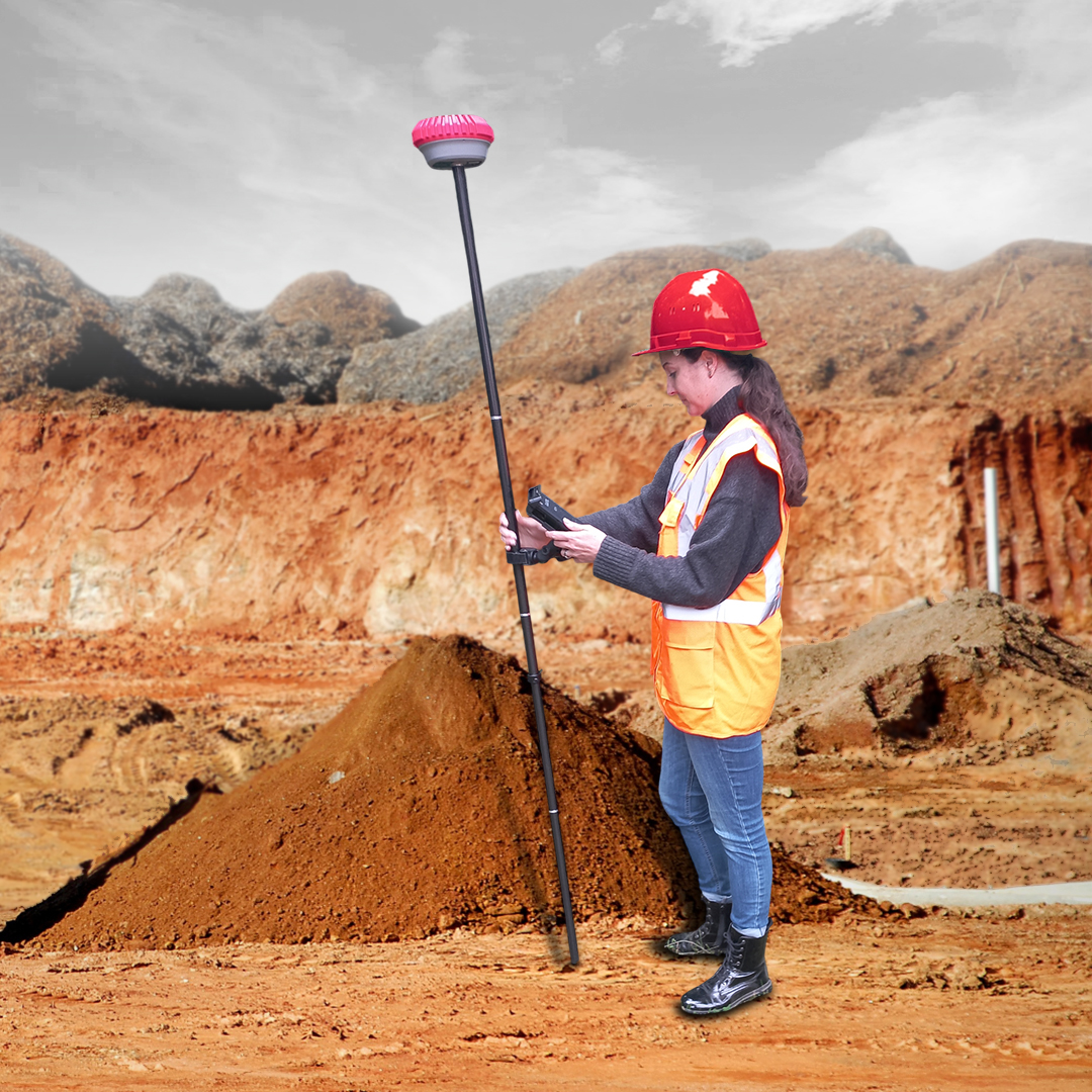 iDig SpotMan GNSS receiver mounted on a survey pole being used as a rover