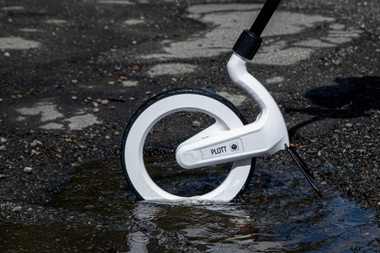 Plott Carta measuring wheel rolling through rain puddle IP54 weatherproof rating