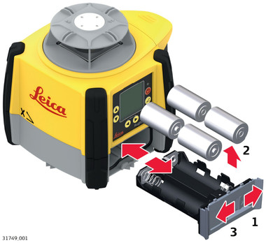 Loading four D-cell batteries into the Leica Rugby 60DG alkaline battery tray