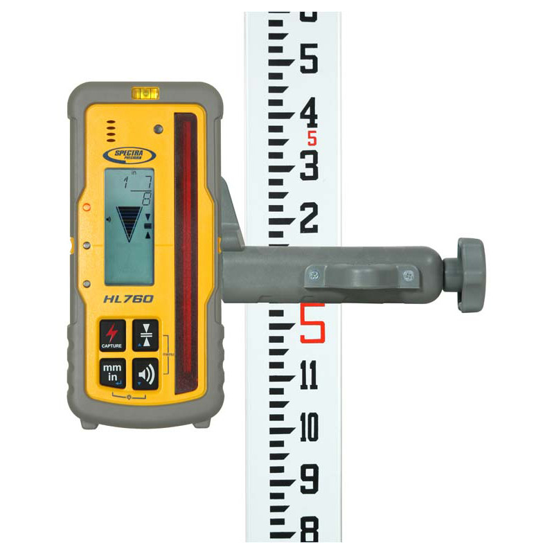 Spectra HL760 laser receiver clamped to a grade rod showing fractional inches