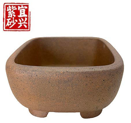 Rectangular, unglazed, slightly textured pot. 14x6.5x12.5cm