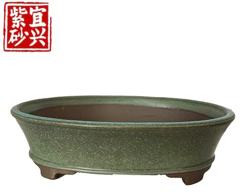 Oval pot with dark green glaze  25x6.5x18cm
