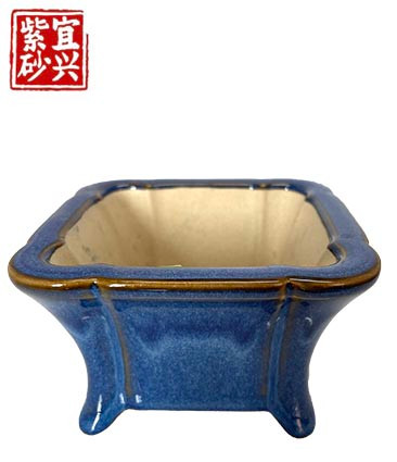 Square pot with translucent blue glaze.  19x6x19cm