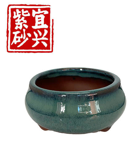 Round turquoise glazed pot