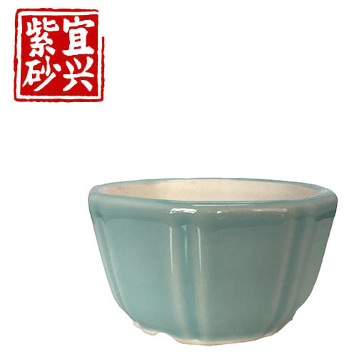 Soft turquoise glazed pot