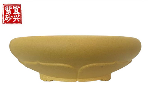 Round pot with petal shaped carving