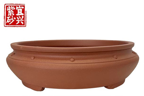 Round pot, terracotta colour  23x7x23cm
