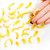 Set 12 mini-banane artificiale - 3,5 cm