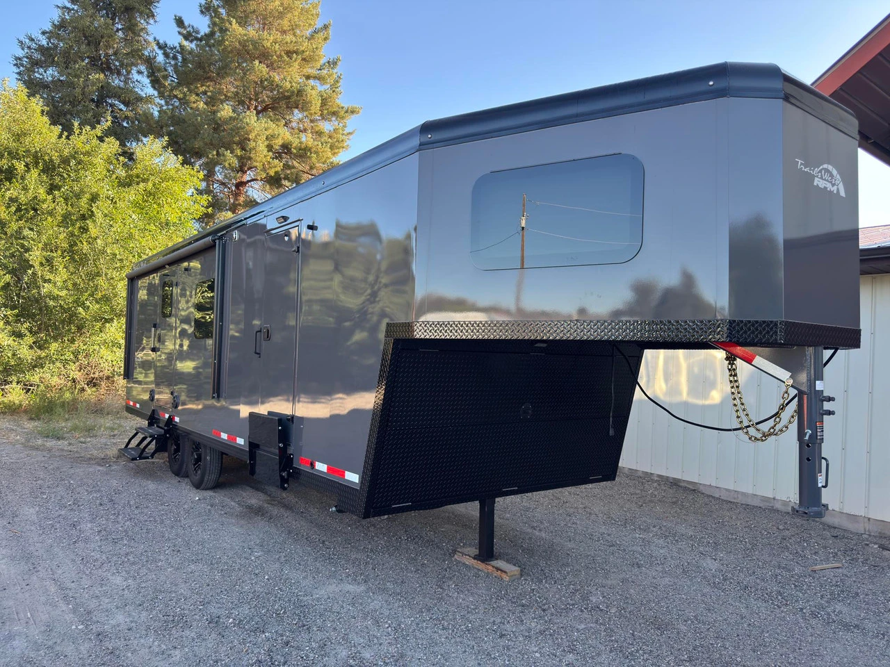 Trails West Trailers 2027 RPM Freeride 24' Powersport Trailer | Tandem Axle, AC, AUX PROPANE, BOOT DRYER, CAR TIE DOWNS, DAY-NIGHT SHADES, 3 EXTRA INT LIGHTS, QUAD 6 VOLT BATTERY, FLOOR INSULATED, FUEL CELL (30 GALLON), GLASS SHOWER DOOR, INVERTER 20