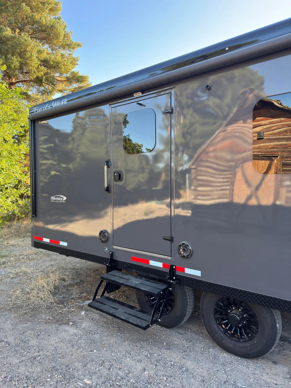 Trails West Trailers 2027 RPM Freeride 24' Powersport Trailer | Tandem Axle, AC, AUX PROPANE, BOOT DRYER, CAR TIE DOWNS, DAY-NIGHT SHADES, 3 EXTRA INT LIGHTS, QUAD 6 VOLT BATTERY, FLOOR INSULATED, FUEL CELL (30 GALLON), GLASS SHOWER DOOR, INVERTER 20