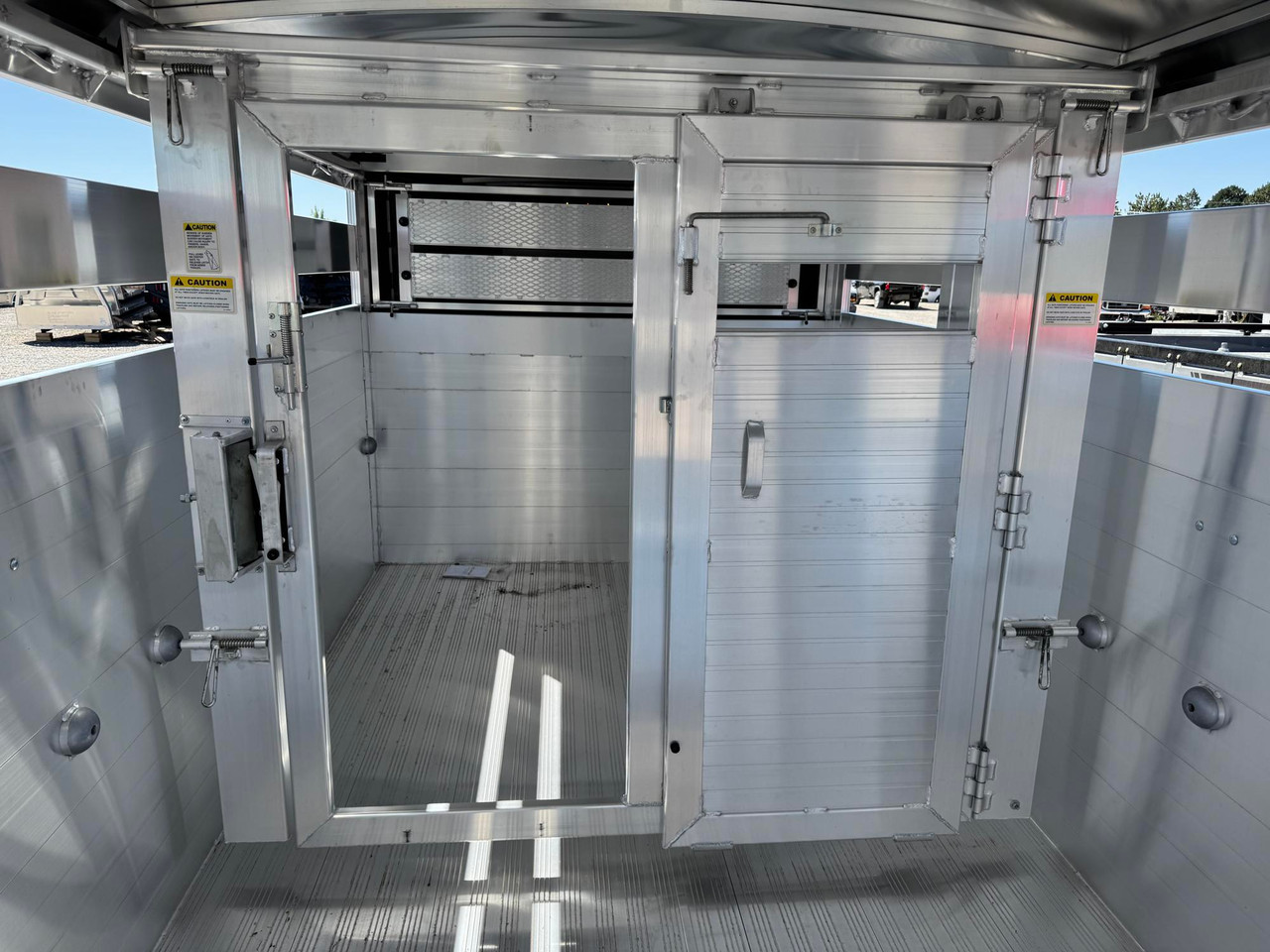 Hillsboro Trailers 2027 Endura 90"X24' Stock Trailer | Tandem Axle 14K, 52" ESCAPE DOOR, 2 CENTER GATES, FRONT ADJ SLIDING CTR GATE, TIE LOOPS, GN SLAM DOOR, EZ LOAD RAMPS, 14K