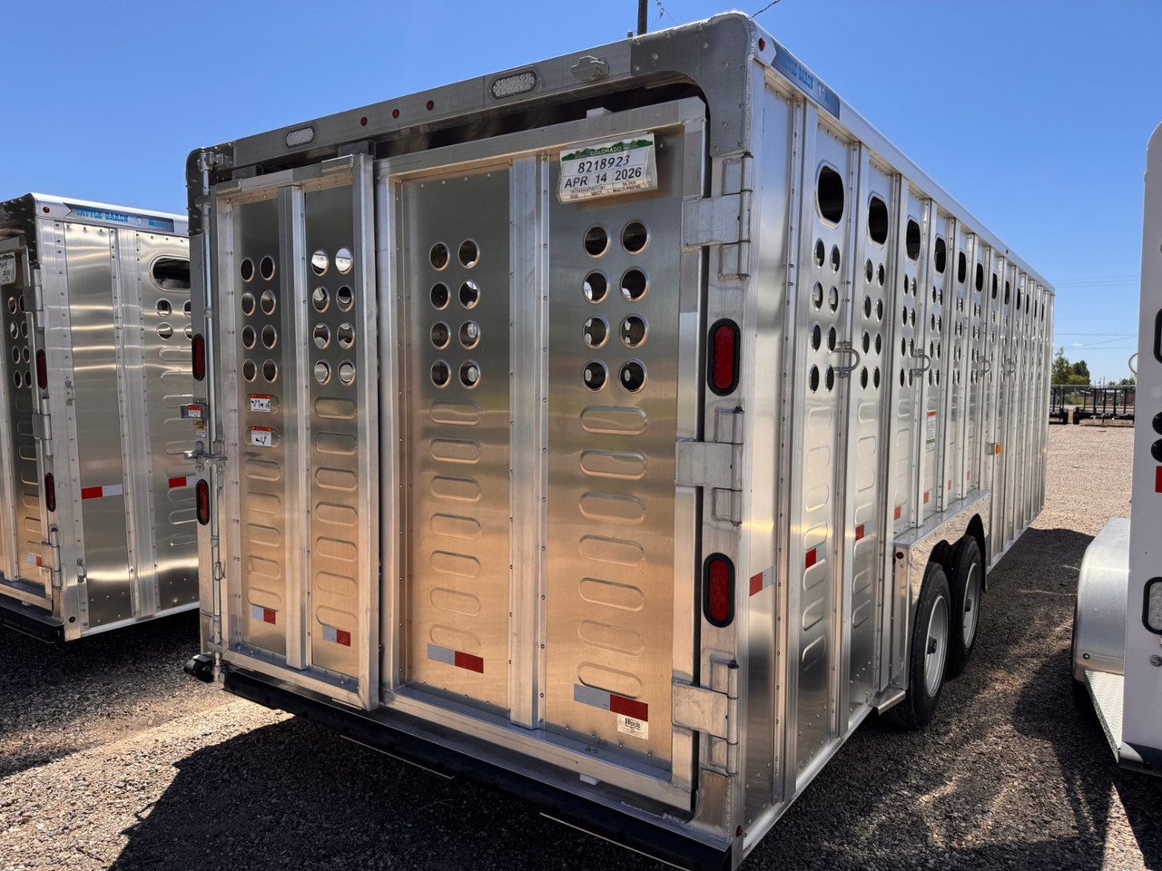 Merritt Trailers 2026 PUNCHSIDE 96"X24' Stock Trailer | Tandem Axle 17K, Aluminum, 52" Driver Escape Door, 2 Center Gates, Spare Tire Mount and Spare Tire