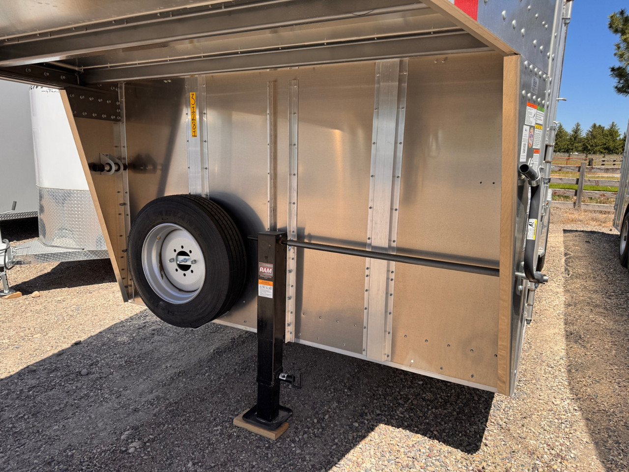 Merritt Trailers 2026 PUNCHSIDE 96"X24' Stock Trailer | Tandem Axle 17K, Aluminum, 52" Driver Escape Door, 2 Center Gates, Spare Tire Mount and Spare Tire