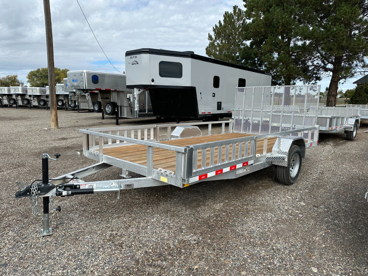 Nordtek Trailers 2025 UT 82"X14' Utility Trailer | Single Axle 3.5K, Open Sides, ATV Side Load Ramps, Solid Rear Ramp Gate
