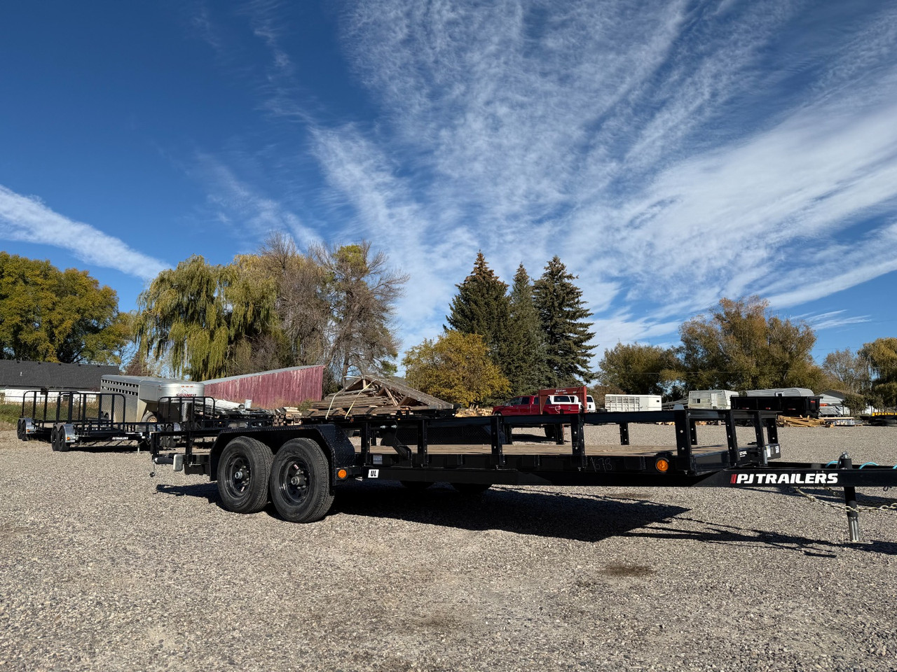 P.J. Trailers 2026 UL 83"X20' Utility Trailer | Tandem Axle 10K, 12" OC Crossmembers, Pull-Out Ramps, Rear Support Jacks, Diamond Plate Steel Fenders