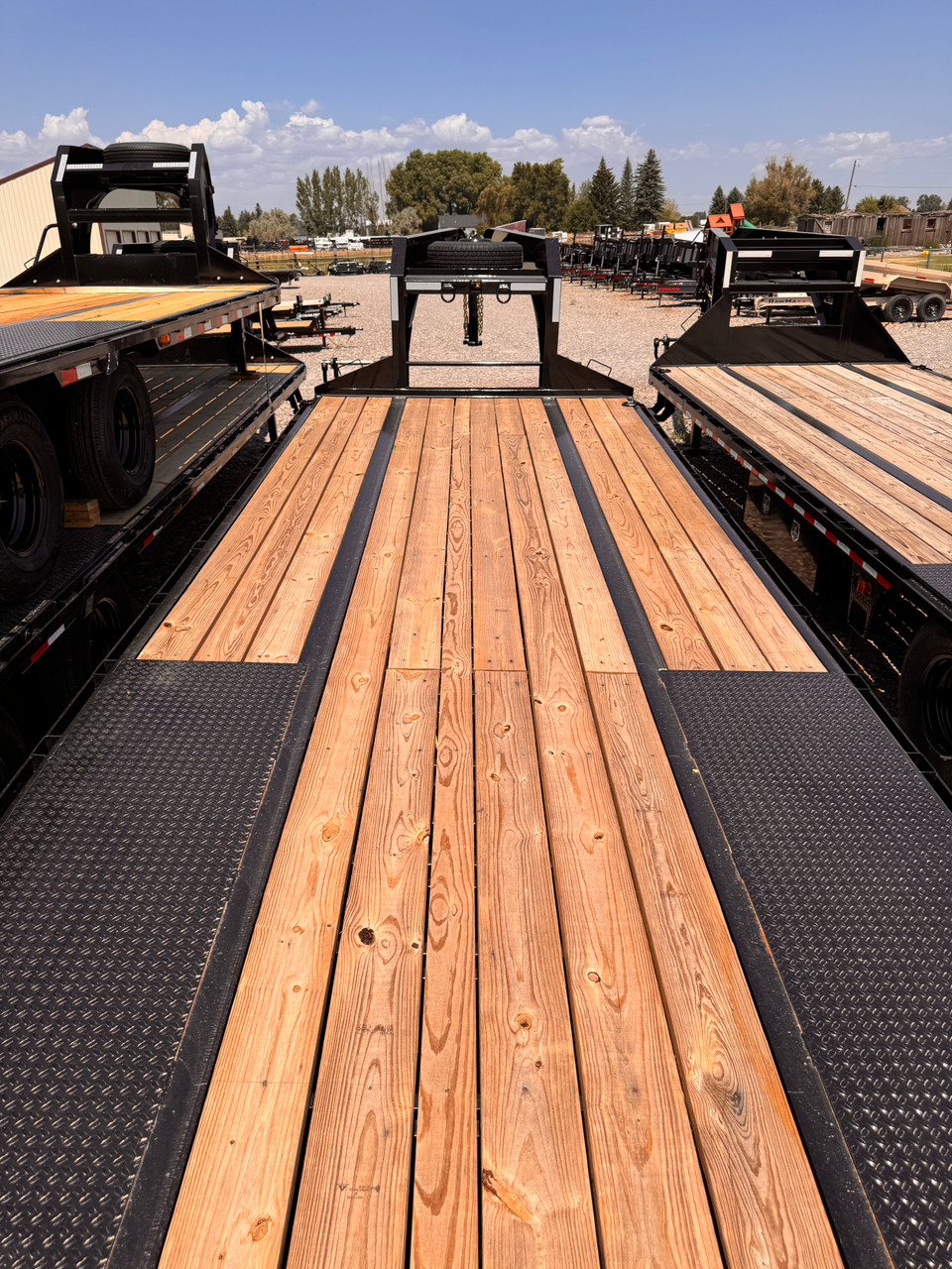 Norstar Trailers 2026 FXG 102"X28' Deckover Flatbed Trailer | Tandem Axle 22K, Engineered I-Beam Frame, Front Tool Box, Rampage Ramps