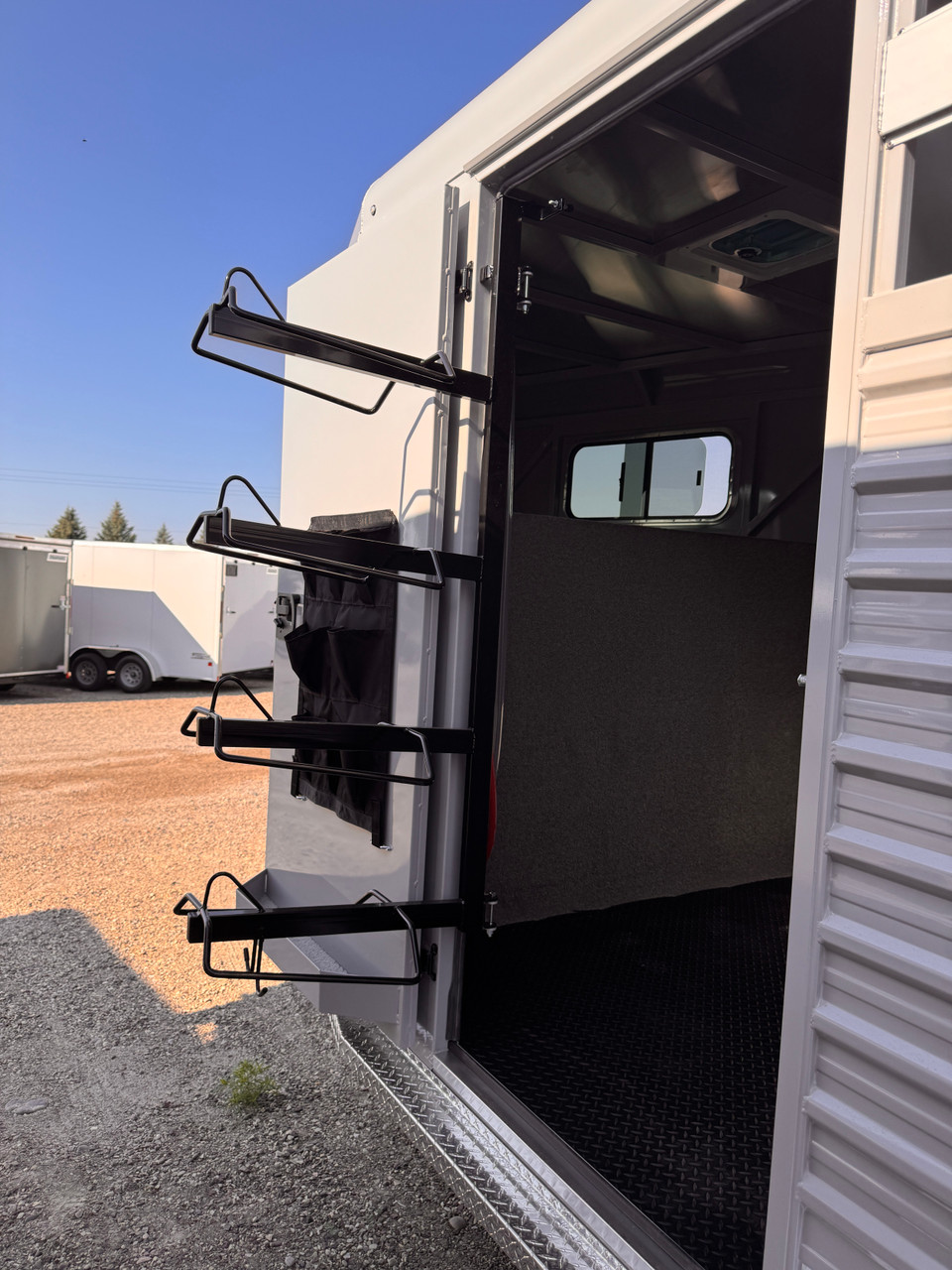 Trails West Trailers 2027 HOTSHOT Stock Combo Trialer | Tandem Axle 18.667K, Rubber Floor, Side Escape Door, Single Divider Gate, Swing Slide Combo Gate, Tack Room, Swing Out Saddle Racks, Water Tank