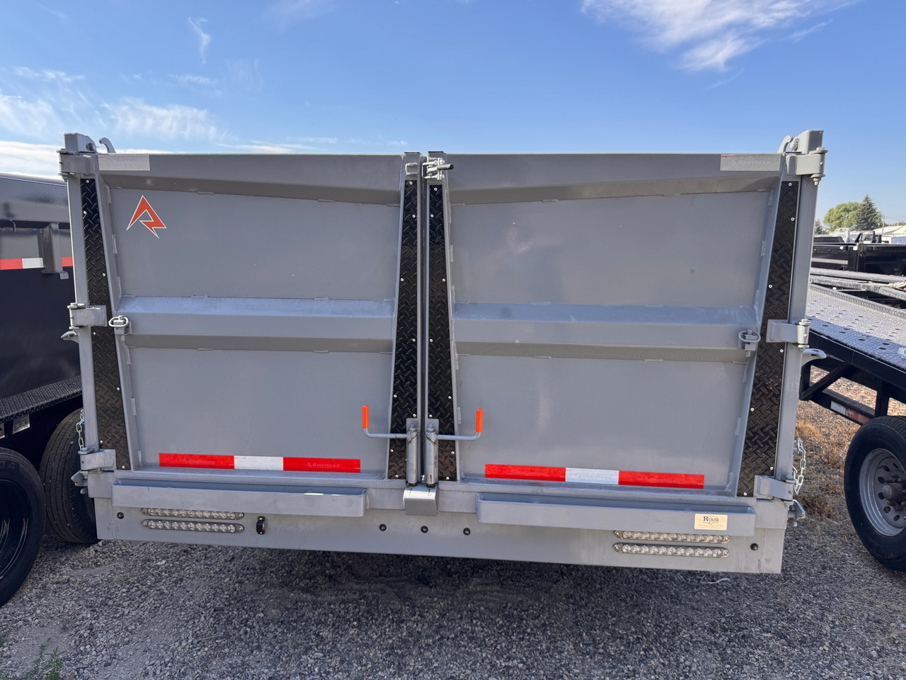 Raw Maxx Trailers 2026 HDX 102"X20' Dump Trailer | Tandem Axle 20K, Dual Tires, Dual Hydraulic Jacks, 44" Sides, Spare Tire, 2 Way Spreader Gate, Tarp Kit, Solar, Dual Storage Cabnets, Ramps