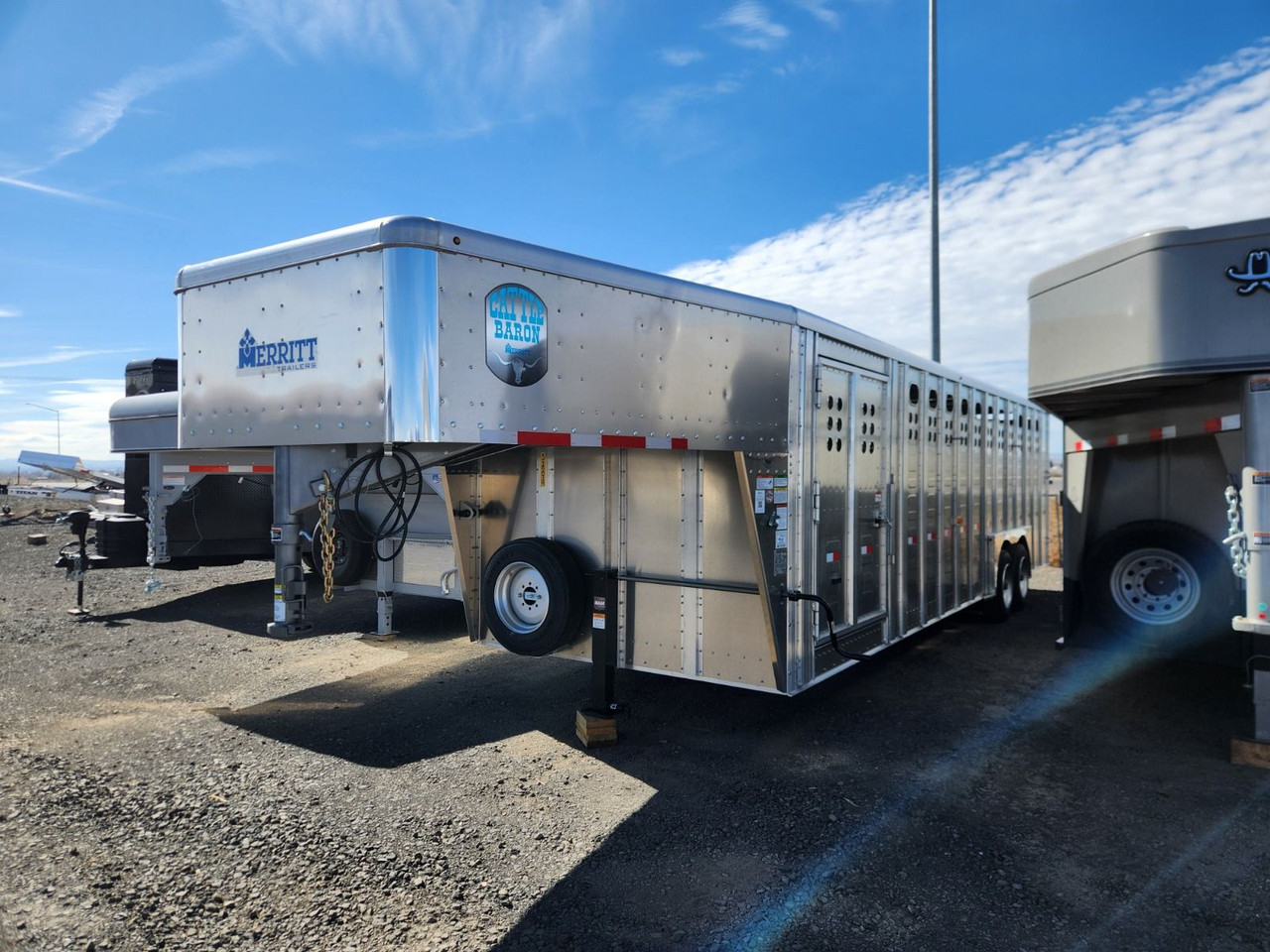 Merritt Trailers 2026 ALUMINUM PUNCHSIDE 96"X28' Stock Trailer | Tandem Axle 17K, 52" Escape Door, 2 Center Gates