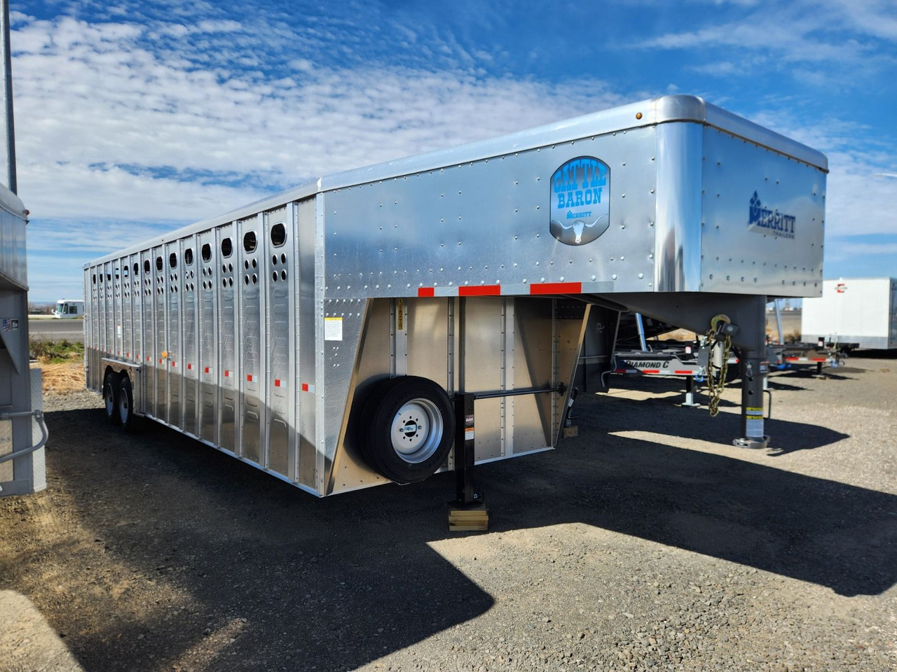 Merritt Trailers 2026 ALUMINUM PUNCHSIDE 96"X28' Stock Trailer | Tandem Axle 17K, 52" Escape Door, 2 Center Gates
